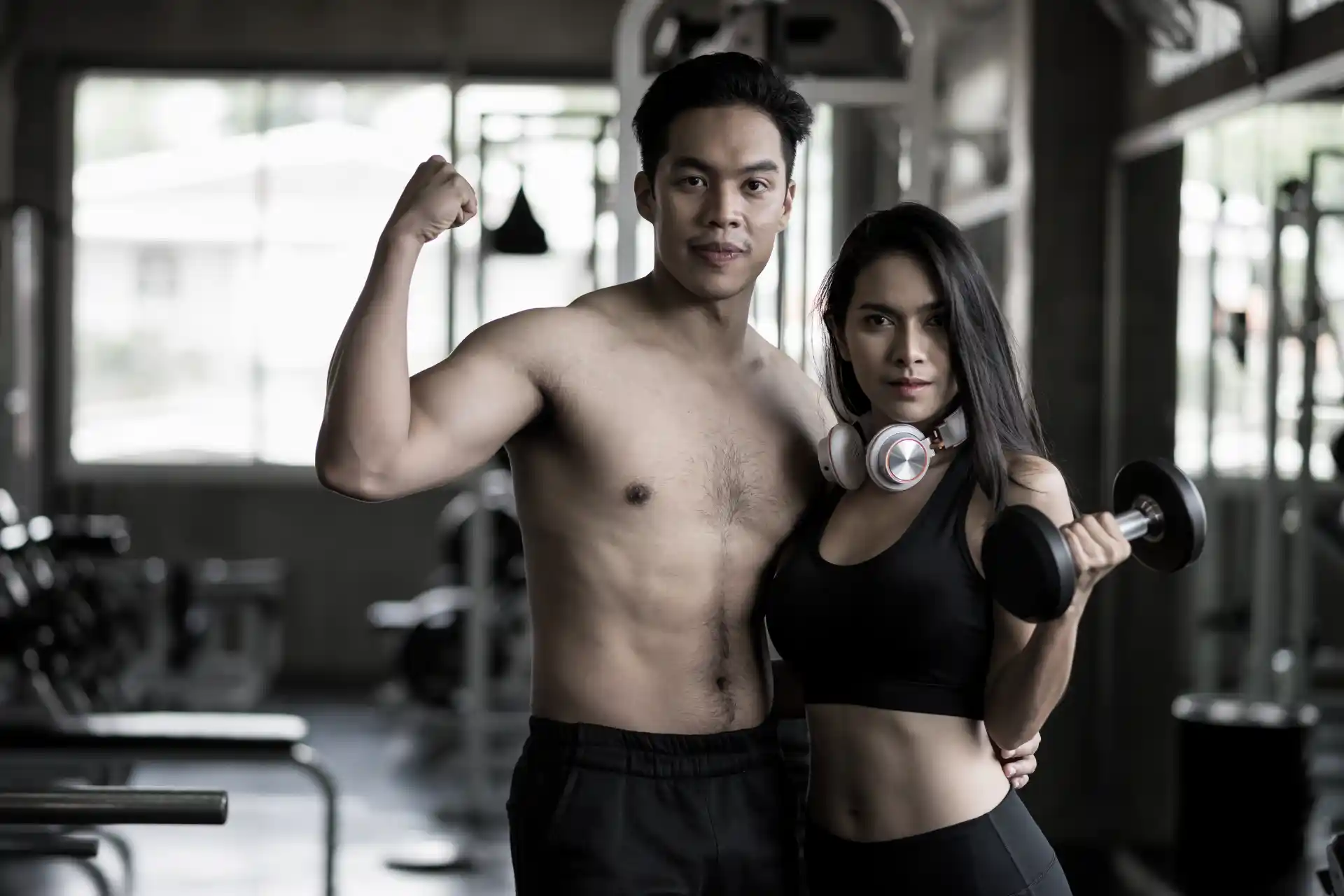 Male And Female Showing Biceps Results